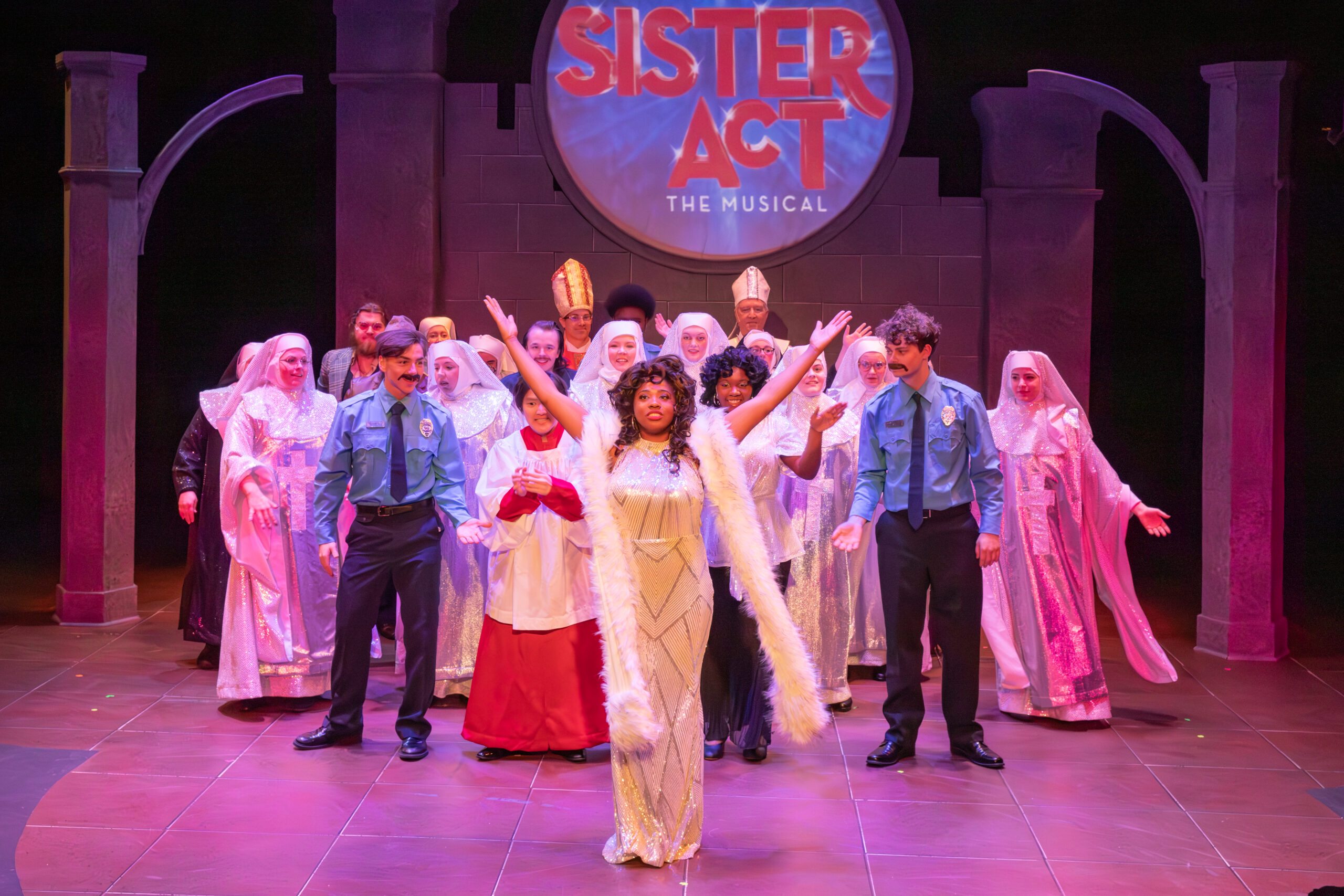 The Cast of Sister act standing on stage of TCC VanTrease PACE